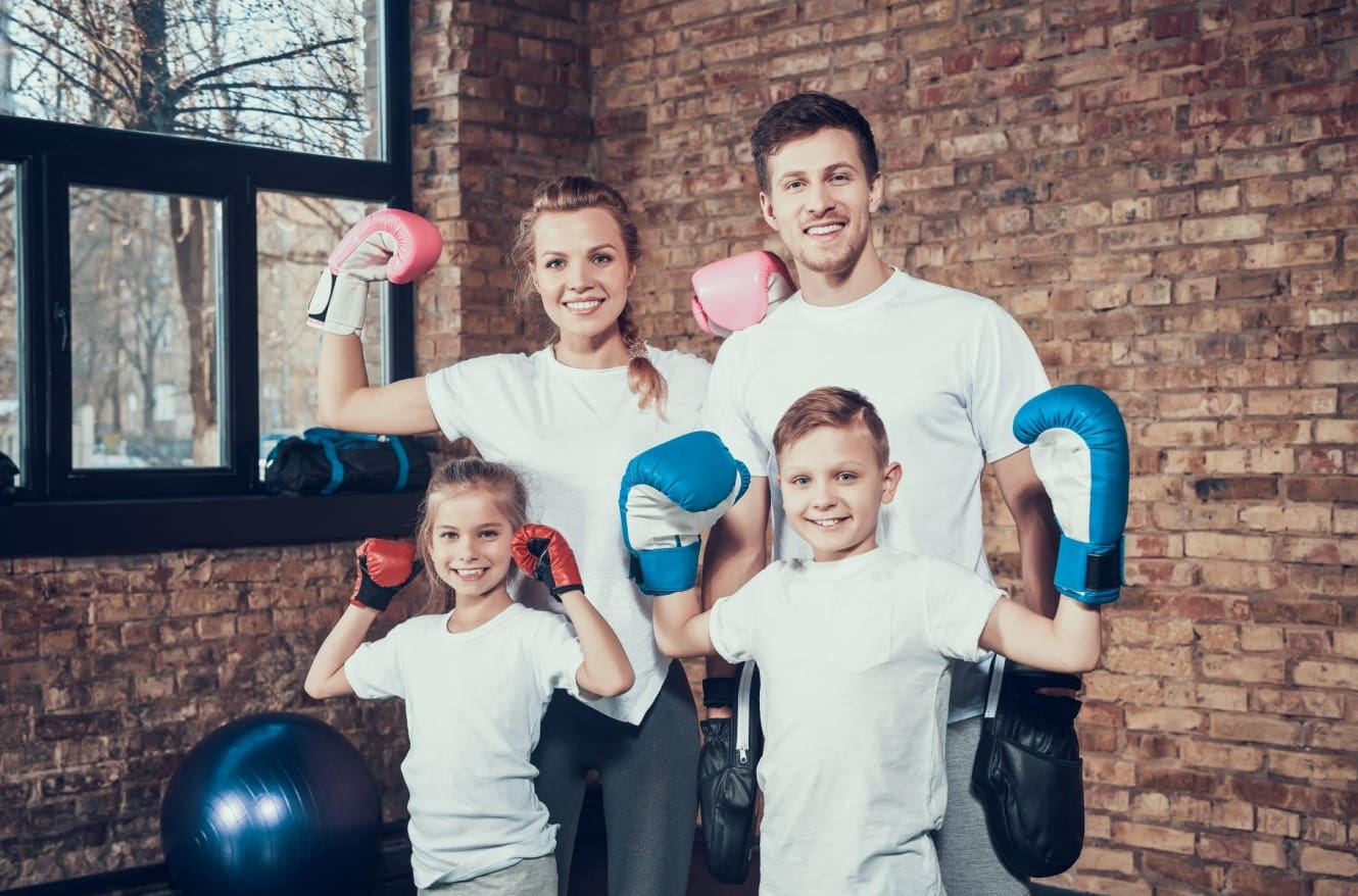 Kids boxing training introduces beginner boxers to the basics of footwork, sparring, and technique, using proper gear like boxing gloves and hand wraps, with warm-ups and workouts designed to help them practice at their own pace while building fitness, focus, and confidence in a safe, structured environment.